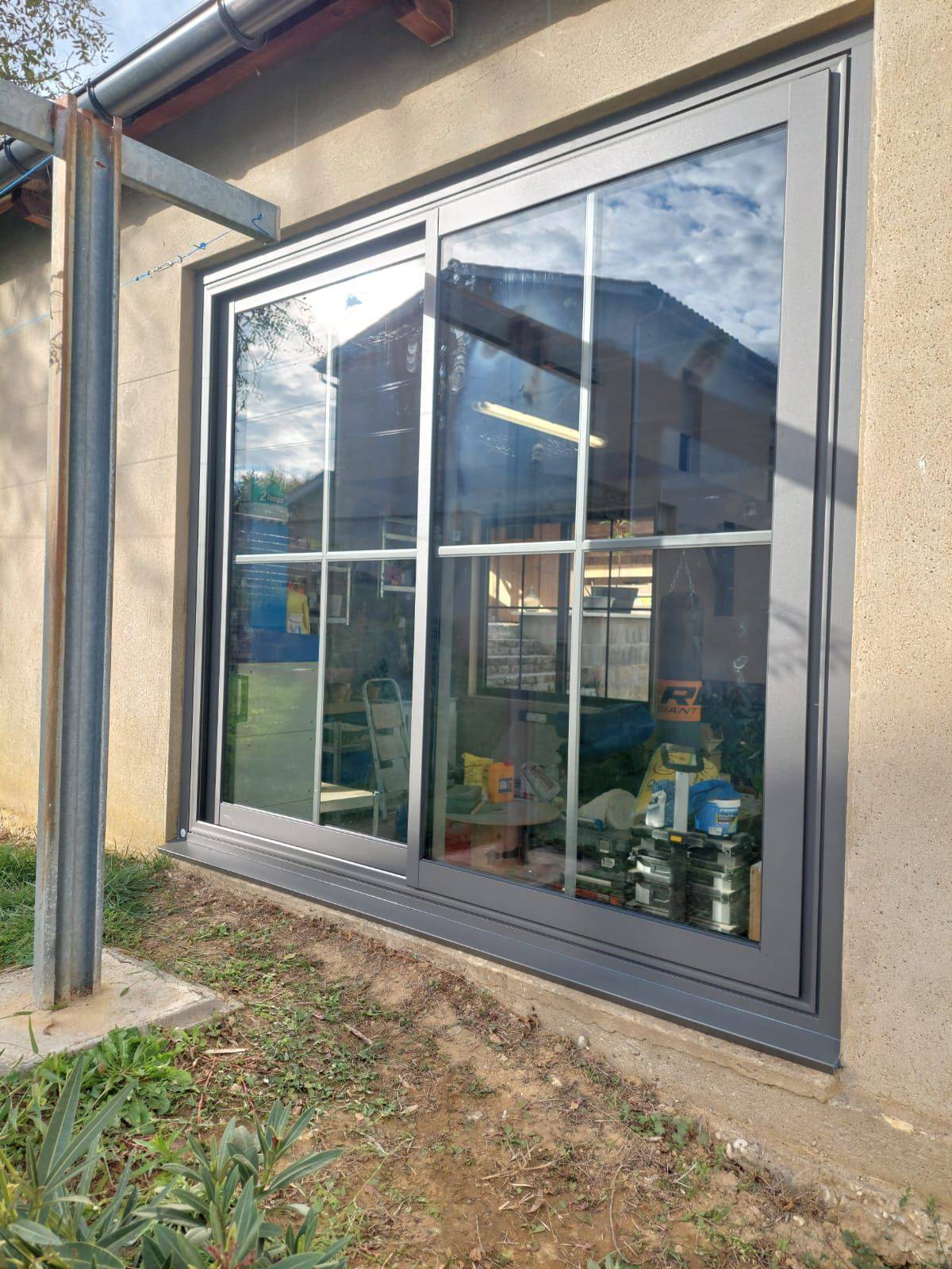 Baie vitrée coulissante en alu gros anthracite à La Tour du Pin