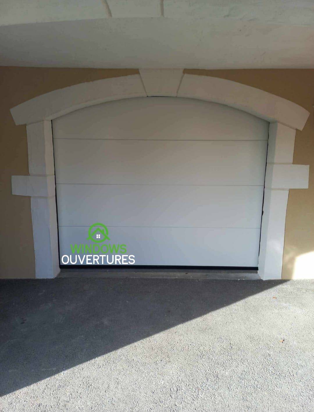 Pose de porte de garage sectionnelle électrique vers Bourgoin Jallieu