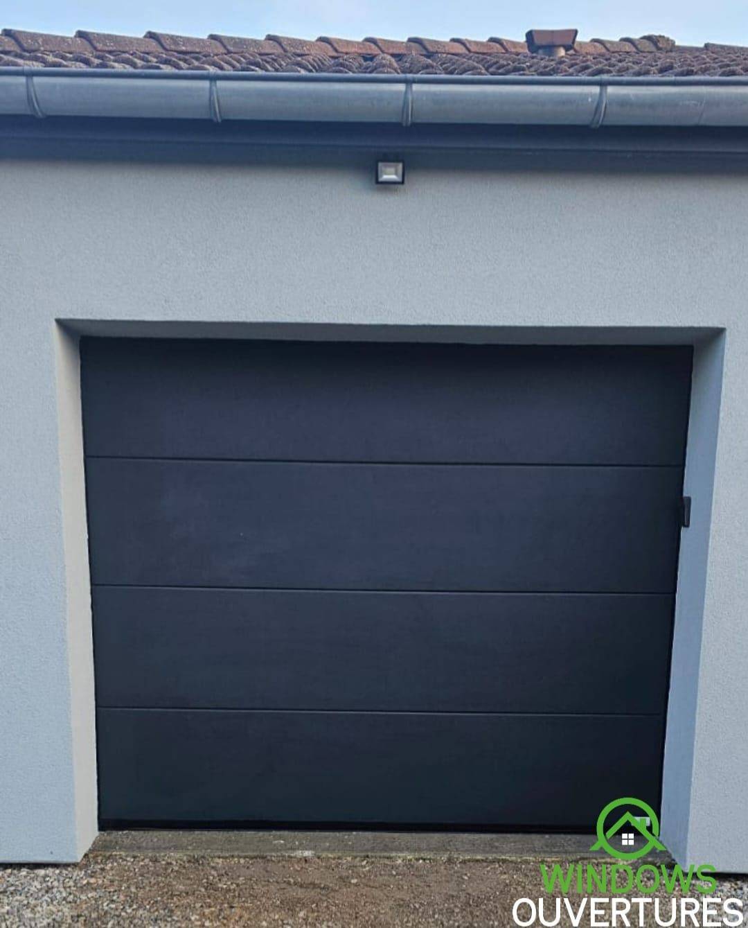 Spécialiste de la porte de garage sectionnelle motorisée vers Bourgoin Jallieu