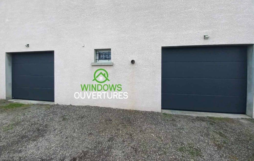 Installation de 2 portes de garage sectionnelles dans copropriété en Isère