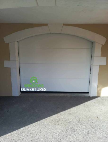 Pose de porte de garage sectionnelle électrique vers Bourgoin Jallieu