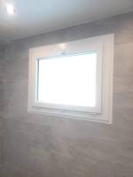 Installation de fenêtre oscillo-battante à Domessin dans le 73