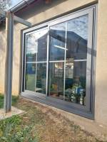 Baie vitrée coulissante en alu gros anthracite à La Tour du Pin