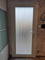 Pose d'une porte d'entrée PVC vitrée vers Chambéry